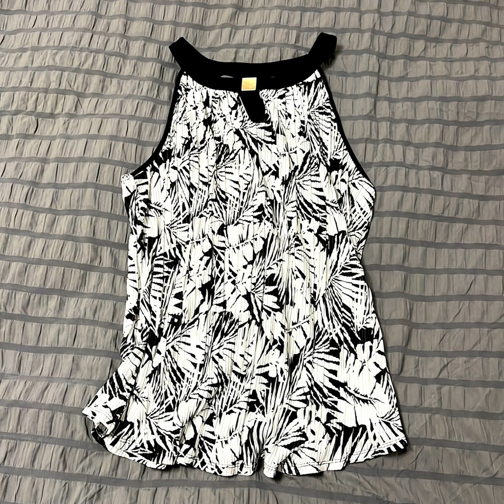 Beautiful flowy tank with open back design